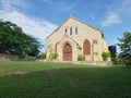 Historic Gilbert Memorial Methodist Church in Antigua and Barbuda under blue sky