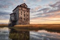 historic grain elevator in a rustic, abandoned setting