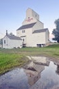 The historic grain elevator is a heritage building in the village of Val Marie in southern Saskatchewan, Canada Royalty Free Stock Photo