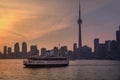 Historic Grandfather Toronto Ferry boat moves through the waters of Lake Ontario's Inner Harbour against the Royalty Free Stock Photo