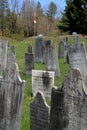 Historic gravestones in grass and hilly landscape, The Revolutionary Cemetery, Salem, New York, 2016