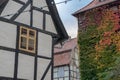 Historic half-timbered house and gable with autumn leaves in Quedlinburg, Germany