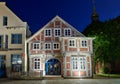 Historic half timbered house in the pedestrian zone in Verden, Germany at night