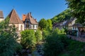 Historic half-timbered houses on the Weiss River in the village center of Kaysersberg Royalty Free Stock Photo