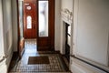 Historic hallway with ancient tiles at an old tenament house in Chwallagasse 2