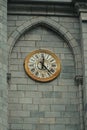 Historic Harmony: Medieval Church and Clock Tower in Lourdes Royalty Free Stock Photo