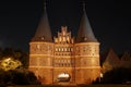 The historic Holstentor of Luebeck by night