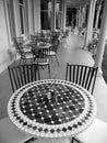 Historic home: verandah cafe tables Royalty Free Stock Photo