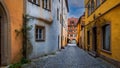 Historic homes along narrow cobblestone alley in historic Rothenberg city