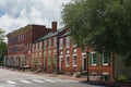 Streetview of a row of renovated historic homes