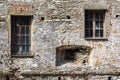 Historic house built in ancient bricks with windows and loopholes. Italian castle Royalty Free Stock Photo