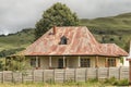 Historic house, with a mountain backdrop, in Bulwer Royalty Free Stock Photo