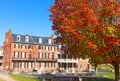 Historic house-museum surrounded by autumn landscape in Harpers Ferry, West Virginia, USA.