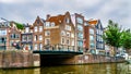 Historic houses with different types of Gables along the Canals in Amsterdam