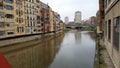 Historic houses and the Eiffel Bridge over the Onyar River, Girona, Catalonia, Spain Royalty Free Stock Photo