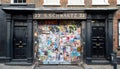 Historic Huguenot Georgian houses with Graffiti, on Fournier Street in Spitalfields, East London, UK Royalty Free Stock Photo