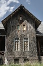 Historic hunting lodge with a facade lined with bark of cork oak