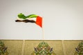Historic Islamic floral design with UAE national flag in Abu Dhabi, Capital of United Arab Emirates