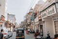 Historic Jagdish mandir road with a crowd of people in Udaipur, India