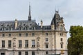 Historic La Conciergerie Buildings and tower of Notre Dame Cathedral in the Ile de la Cite in central Paris, France