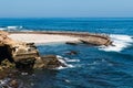 Historic La Jolla Children`s Pool with Eroded Cliffs Royalty Free Stock Photo