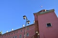 Historic lanterns against the background of the Royal Castle in Warsaw in the light of the rising sun