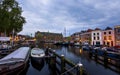 Historic Leiden city centrum under twilight, The city is intersected by numerous small canals with tree-bordered quays Royalty Free Stock Photo