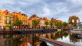 Historic Leiden city centrum under twilight, The city is intersected by numerous small canals with tree-bordered quays Royalty Free Stock Photo