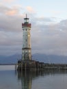 Historic lighthouse at Lindau harbor entrance on Lake Constance Royalty Free Stock Photo