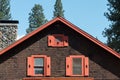 Rustic lodge gable end windows Royalty Free Stock Photo