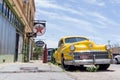 Historic Lowell Arizona - Old Business Signs and Classic Car Taxi on Street Royalty Free Stock Photo