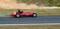 Historic Maserati F1 racing car at speed