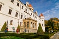 Historic Medieval Konopiste castle residence of Habsburg imperial family, white tower, terrace of romantic gothic baroque Chateau