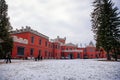 Historic Medieval Romantic castle Hradek u Nechanic with red facade, neo-gothic chateau before Christmas at winter day, Nechanice