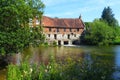 Historic mill building with mill pond.