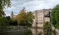 Historic mill building on the River Avon in the centre of Bradford on Avon in the Cotswolds, Wiltshire UK. Royalty Free Stock Photo