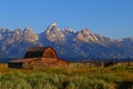 The Grand Teton sunrise reflection at Historic Moulton Barn in Grand Teton National Park,