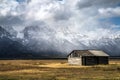 quaint Moulton barn wintry autumn weather on snow capped Grand Teton national Park in Wyoming Royalty Free Stock Photo