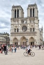 The historic Notre Dame Cathedral in Paris on a cloudy day