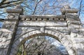 Historic Oakwood cemetery entrance and Spring trees in bloom in Raleigh North Carolina