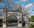 Historic Oakwood cemetery entrance and Spring trees in bloom in Raleigh North Carolina