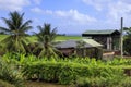 Attractive and scenically situated historic old rum distillery buildings at Distillerie Longueteau in Caribbean Guadeloupe