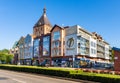 Historic old town quarter with XIV century gothic Cathedral and Merkury shopping center in Koszalin in Poland Royalty Free Stock Photo