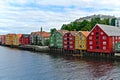 Wooden houses with colorful facades over the river Nidelva in Trondheim Norway Royalty Free Stock Photo