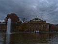 Historic opera house of Stuttgart, Germany, venue of Staatsoper and Ballet, on the shore of small lake with fountain. Royalty Free Stock Photo