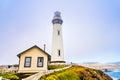 Historic Pigeon Point Lighthouse on the Pacific Ocean Coastline on a foggy day, California; Pigeon Point Lighthouse built in 1871 Royalty Free Stock Photo