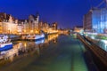 Historic port crane over Motlawa river in Gdansk at night, Poland Royalty Free Stock Photo