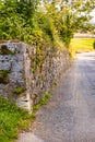 Historic protection wall of castle next to path or road