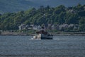 Historic PS Waverley sailing through Clyde Greenock in Scotland in the background of scenic forests