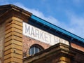 historic public market building with signs and posters in Scarborough yorkshire Royalty Free Stock Photo